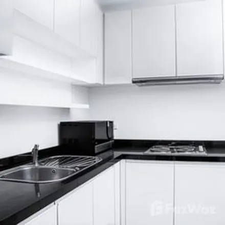 Rent this 3 bed apartment on Soi Rame IX Soi 7 in Huai Khwang District, 10310