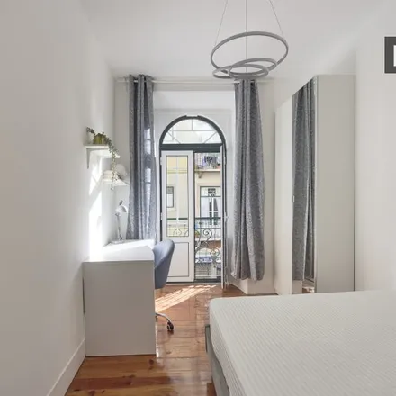 Rent this 8 bed room on Rua da Ilha do Pico 20 in 1000-169 Lisbon, Portugal