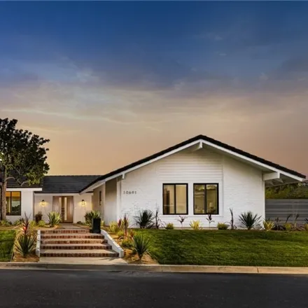 Buy this 4 bed house on 10691 Equestrian Drive in Cowan Heights, CA 92705