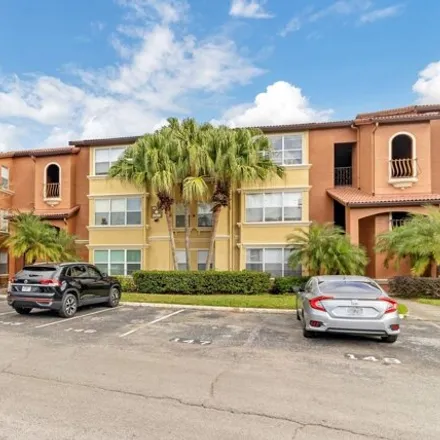 Rent this 2 bed condo on Shingle Creek Trail in Orlando, FL 32811