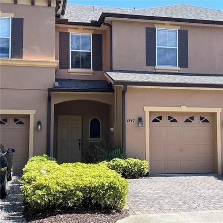 Rent this 3 bed townhouse on 1334 Retreat View Circle in Sanford, FL 32771