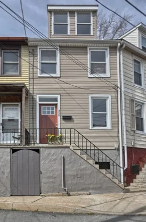 Rent this 3 bed townhouse on 329 Perry Street