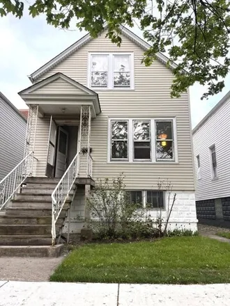 Buy this 3 bed house on 2317 North Lockwood Avenue in Chicago, IL 60641