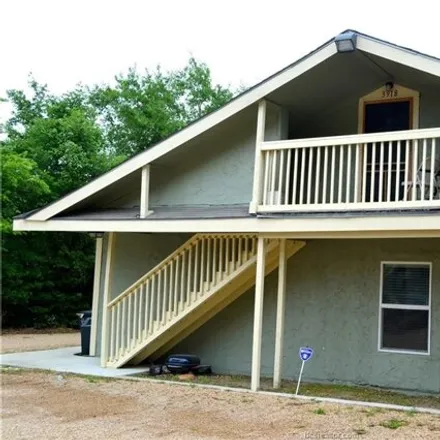 Rent this 3 bed house on Koppe Bridge Bar & Gril in 3940 Harvey Road, College Station