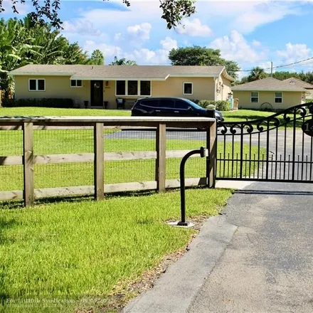 Buy this 4 bed house on 14450 Southwest 24th Street in Davie, FL 33325