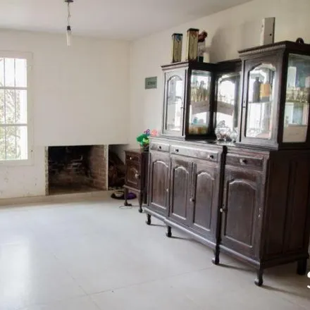 Buy this 3 bed house on Calle 13 in Partido de La Plata, 1896 City Bell