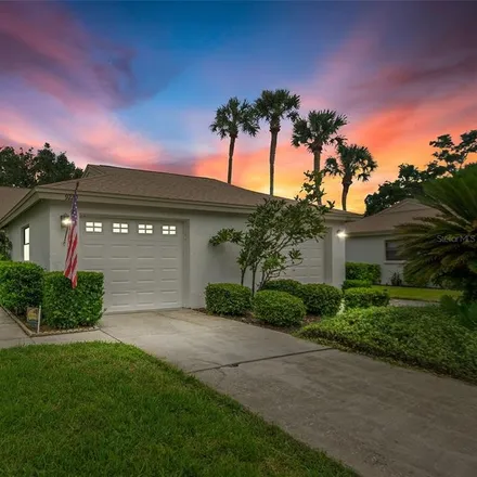 Buy this 2 bed house on 9201 Championship Lane in Seven Springs, FL 34655