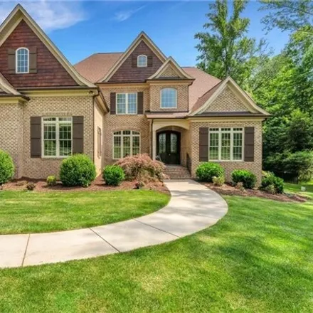 Buy this 4 bed house on 7505 Shadow Creek Dr in Summerfield, North Carolina