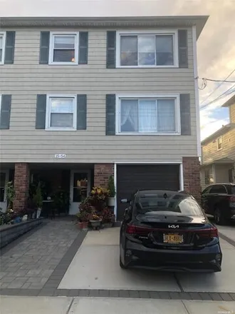 Rent this 3 bed house on 15-54 209th Street in New York, NY 11360