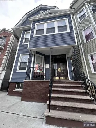Buy this 8 bed house on 302 New York Avenue in Newark, NJ 07105