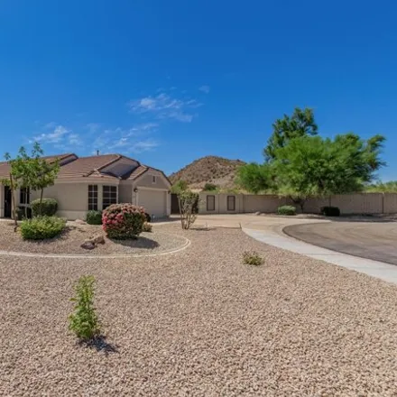 Rent this 3 bed house on 1022 North 90th Circle in Mesa, AZ 85207