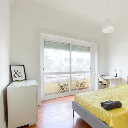 Rent this 7 bed room on Faculdade de Ciências Sociais e Humanas - Universidade Nova de Lisboa in Avenida de Berna, 1050-038 Lisbon