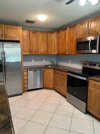 Rent this 3 bed condo on 195 Meadows Drive in Boynton Beach, FL 33436