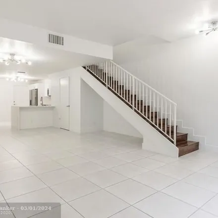 Rent this 3 bed apartment on 1370 Sorrento Drive in Weston, FL 33326
