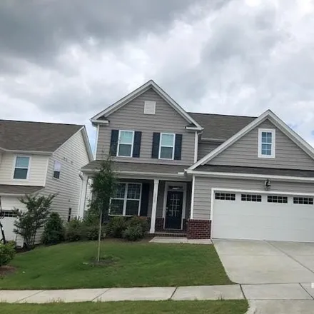 Rent this 4 bed house on 5525 Teversham Way in Cary, North Carolina