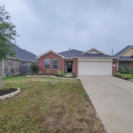 Rent this 4 bed house on 31203 Gulf Cypress Lane in Harris County, TX 77447