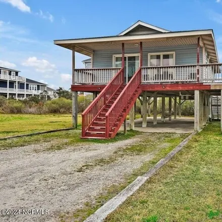Buy this 3 bed house on 5202 Southeast Pelican Drive in Oak Island, Brunswick County