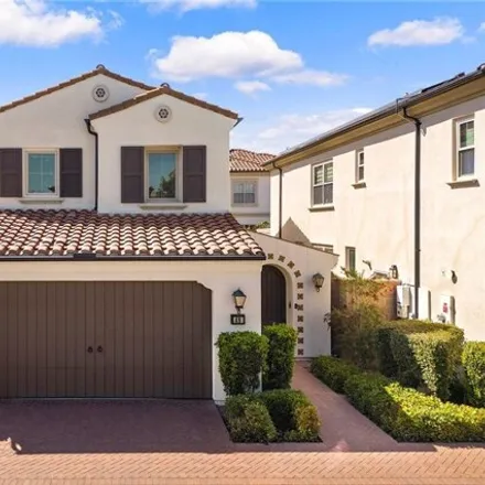 Rent this 4 bed condo on 68 Ashdale in Irvine, CA 92618