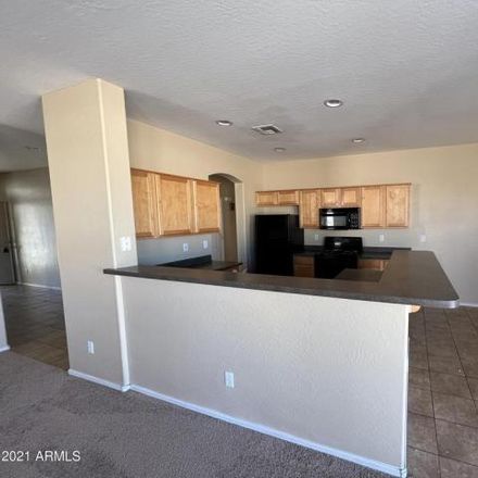 Rent this 3 bed house on 3298 South 104th Avenue in Phoenix, AZ 85353
