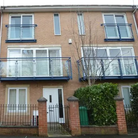 Rent this 3 bed townhouse on 18 The Sanctuary in Manchester, M15 5TR