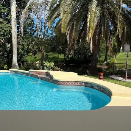 Rent this 4 bed house on 5452 Southwest 88th Terrace in Cooper City, FL 33328