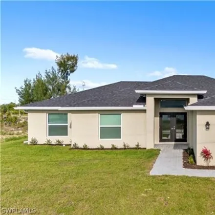 Rent this 4 bed house on 2399 Northeast 5th Place in Cape Coral, FL 33909