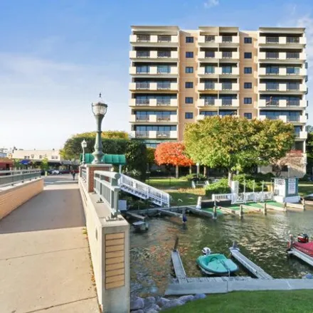 Buy this 2 bed condo on Leather Lips Boat Rentals in Wrigley Drive, Lake Geneva