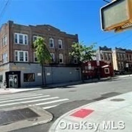 Buy this 6 bed house on 64-02 Fresh Pond Road in New York, NY 11385