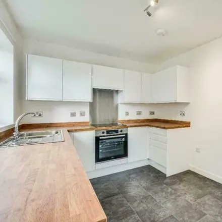 Rent this 3 bed townhouse on Coniston Drive in Hollins, BL9 9PX