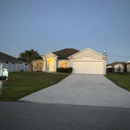 Rent this 4 bed house on 4540 Southwest Rachel Street in Port Saint Lucie, FL 34953