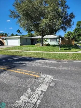 Rent this 3 bed house on 829 Southeast 3rd Terrace in Garden Isles, Pompano Beach