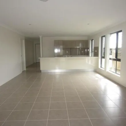 Rent this 4 bed apartment on Catho Avenue in Mount Low QLD 4818, Australia