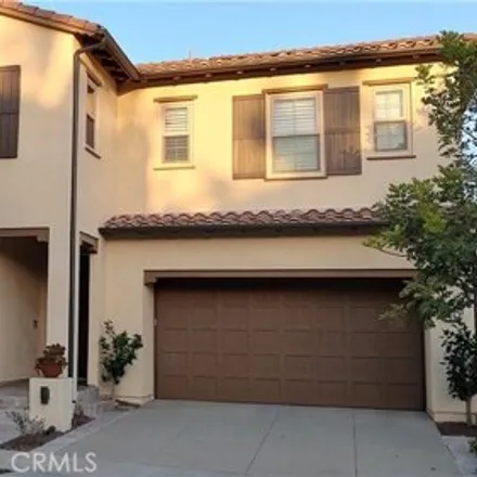 Rent this 4 bed house on 68 Rossmore in Irvine, California