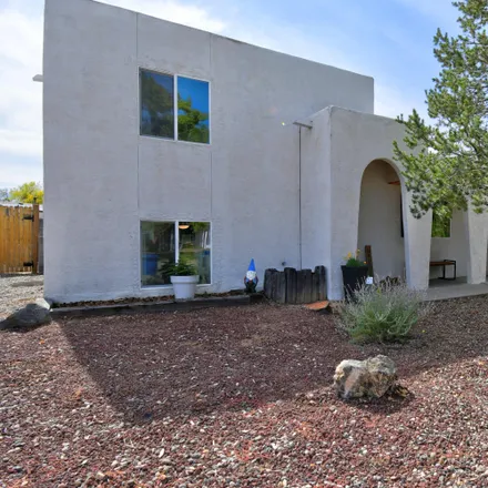 Buy this 3 bed house on 10412 Delicado Place Northeast in Oso Grande, Albuquerque