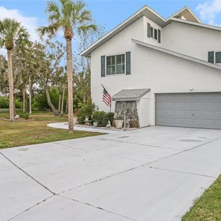 Buy this 3 bed house on 4674 Rickover Court in Elfers, FL 34652