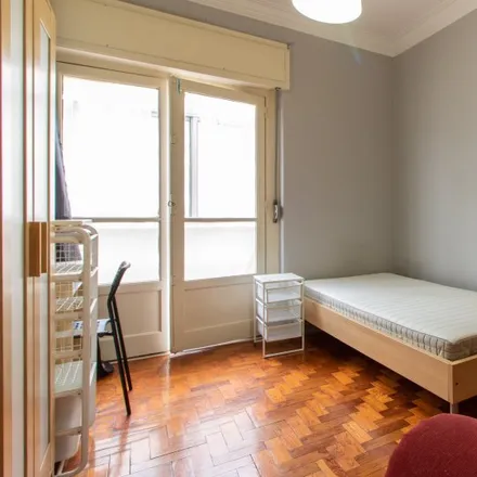 Rent this 4 bed room on Rua Cidade de Cacheu in 1500-004 Lisbon, Portugal