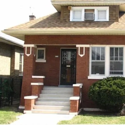 Buy this 4 bed house on 1411 North Long Avenue in Chicago, IL 60651