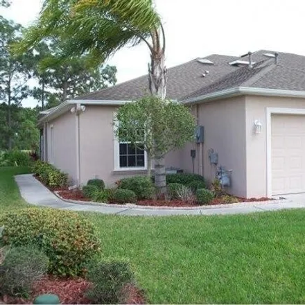 Rent this 3 bed townhouse on 2000 Muirfield Way in Palm Bay, FL 32909