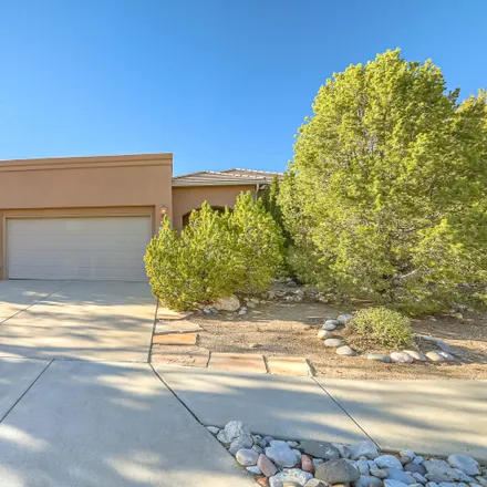 Buy this 4 bed house on 12911 Chitalpa Place Northeast in High Desert, Albuquerque