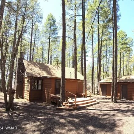 Buy this 2 bed house on 1346 Joe Woods Drive in Pinetop-Lakeside, Navajo County