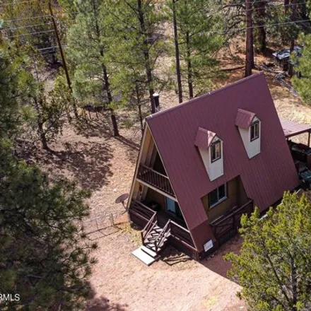 Buy this 2 bed house on 1975 Little Doe Trail in Navajo County, AZ 85933