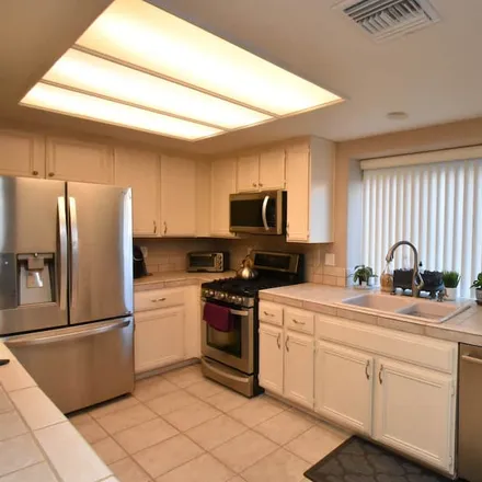 Rent this 4 bed house on Indian Wells in CA, 92210