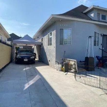 Buy this 4 bed house on 2766 West 14th Street in Los Angeles, CA 90006