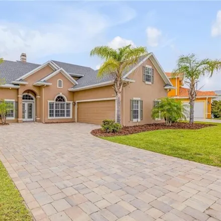 Buy this 4 bed house on 4 Lakewalk Dr S in Palm Coast, Florida