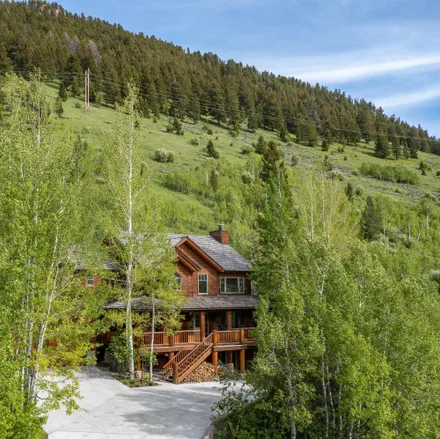 Buy this 4 bed house on 2128 Hidden Ranch Lane in Jackson, WY 83001