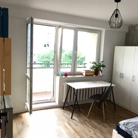 Rent this 4 bed room on Czerniakowska 26A in 00-714 Warsaw, Poland