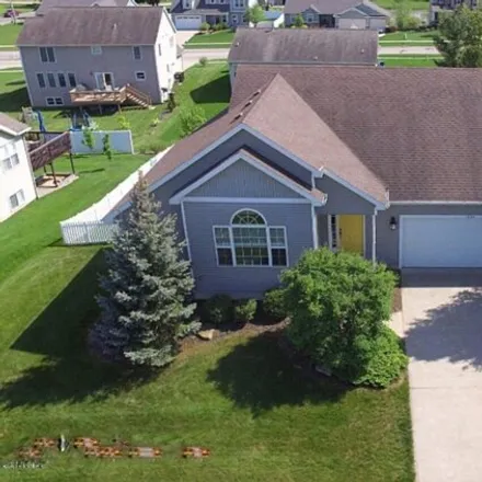 Buy this 4 bed house on 1650 Mycah Drive Southwest in Byron Center, MI 49315