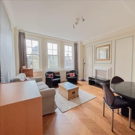 Rent this 2 bed apartment on Queens Court in Queensway, London