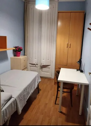 Rent this 4 bed room on Casa Lamadrid in Carrer de Girona, 08001 Barcelona