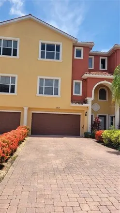 Rent this 4 bed townhouse on 1213 3rd Street Dr E in Palmetto, Florida